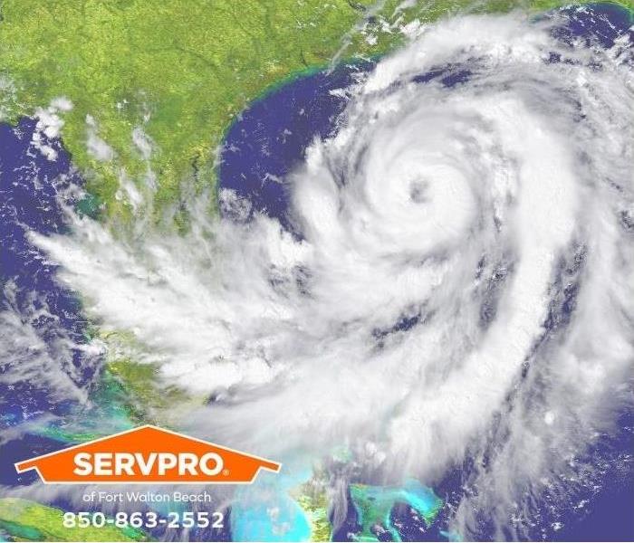 A satellite view of a hurricane over Florida is shown.