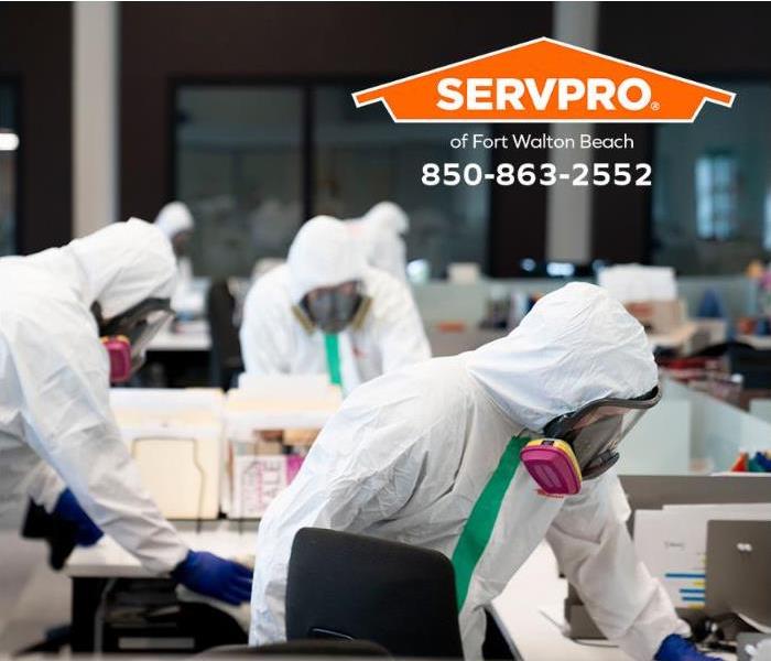 SERVPRO technicians are decontaminating an office.
